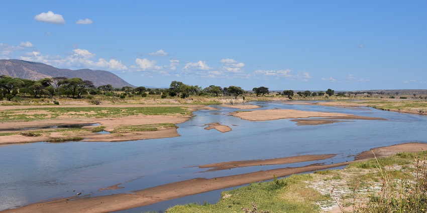 Ruaha River with sandy grounds on distant hills at Ruaha National Park, near Mikumi National Park