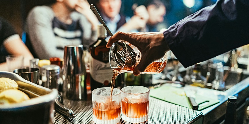 Image of a Man Preparing Cocktails in a Bar - explore SUN’s Bar Lounge