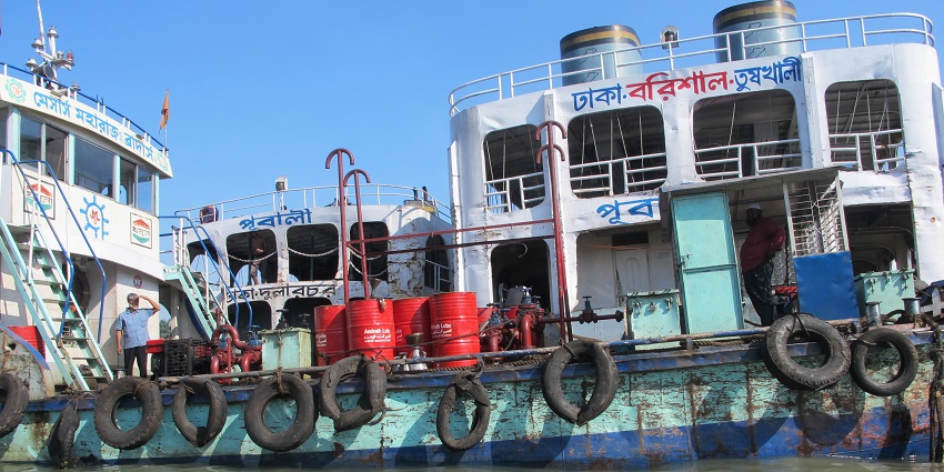 Bustling riverfront with boat rides, markets, and local culture.