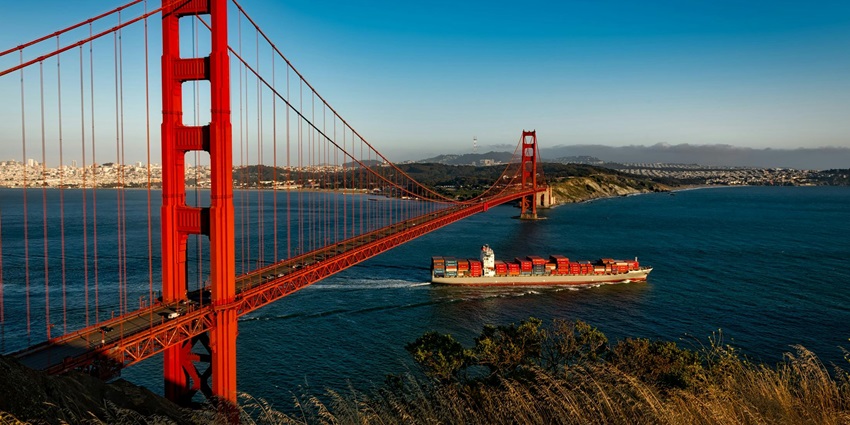 Image of Golden State Bridge, California and vibrant cultural scene near water body