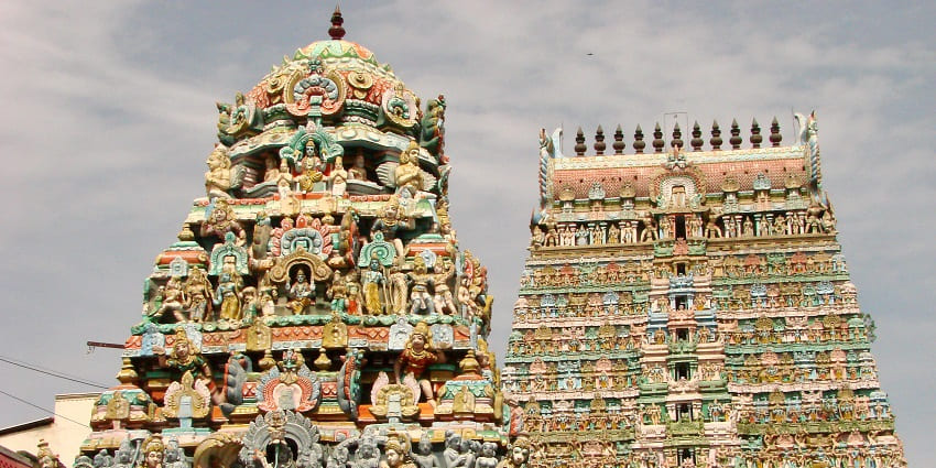 Gopurams of Sarangapani Temple, with detailed carvings and vibrant statues and colours
