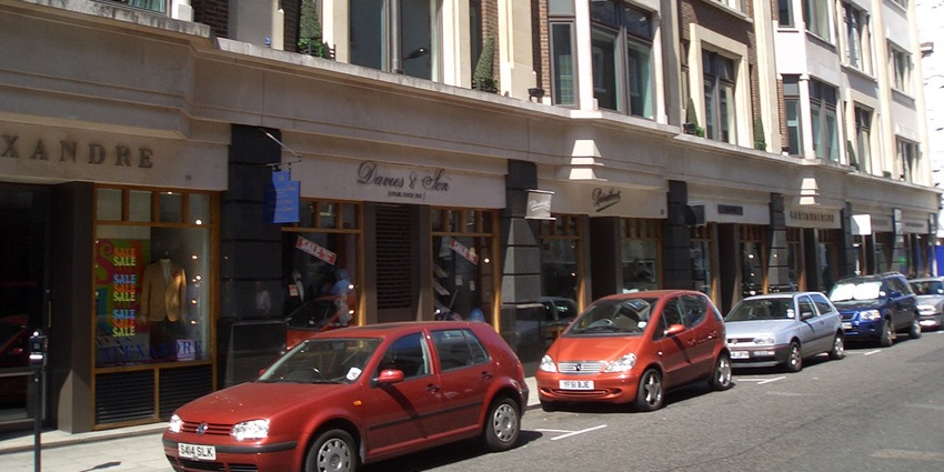 A vibrant Image of the view of Savile Row from the Burlington Gardens in London.