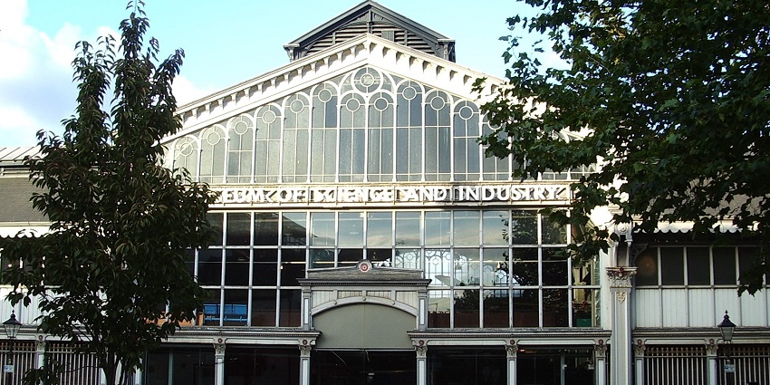 An image showing the front view of the Museum of Science and Industry, highlighting its grandeur.