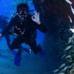 Scuba diving in Oman offers vibrant reefs, marine life, and adventure.