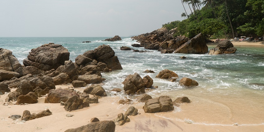Secret Beach offers secluded sands, crystal-clear waters, and peaceful surroundings.