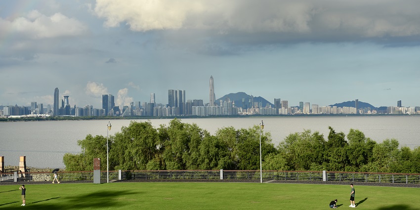 A scenic waterfront park with paths, and gardens is a must-visit as per the Shenzhen city guide.