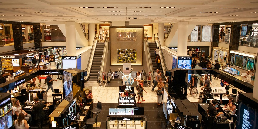 Distant view of people wandering around in the mall, a unique shopping experience
