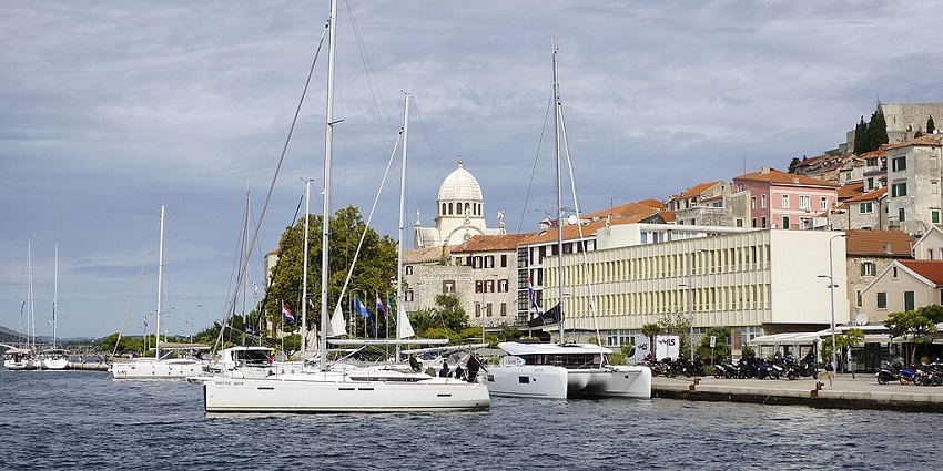 An image of Šibenik with historic sites, the sea, and old town streets