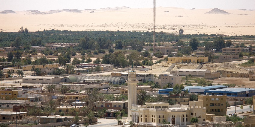 Siwa Oasis with traditional Egyptian buildings, partial greenery, suitable to celebrate Valentine’s Day in Egypt.