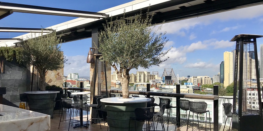 Trendy rooftop cafe with panoramic views and a delicious menu.