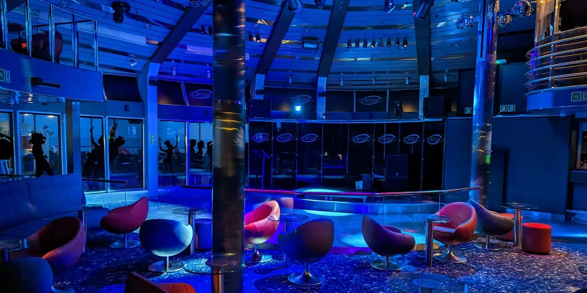 Stylish rooftop bar offering panoramic city views and cocktails.