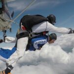 A view of skydiving in Prague with stunning views of the city and landscape below.