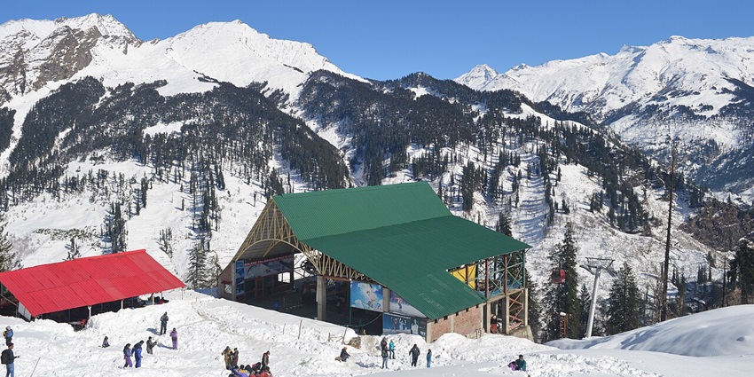 Tourists enjoy the Solang Ropeway in snow-laden Solang Valley, near Manali, HP.