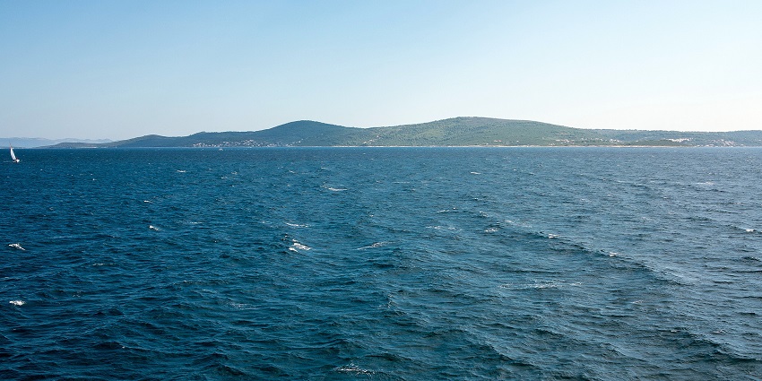 Scenic view of harbor and vineyards of Šolta Island, Croatia