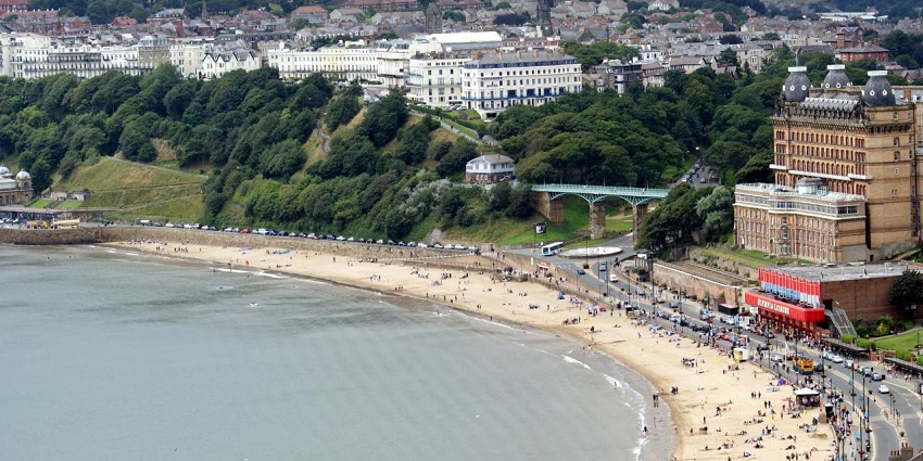 An image of South Bay Beach, a classic British seaside beach in Scarborough, England.