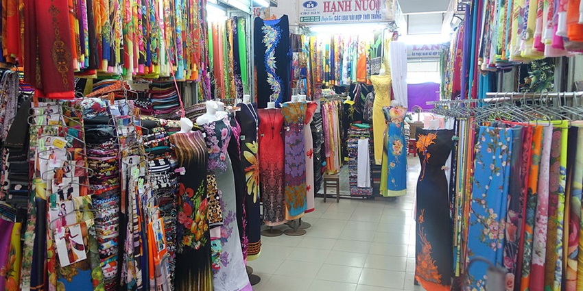 Shop with a variety of fabrics in the South Bund Fabric Market.