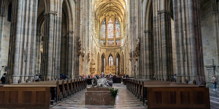 Experience the stunning Gothic architecture of St. Vitus Cathedral in Prague Castle.