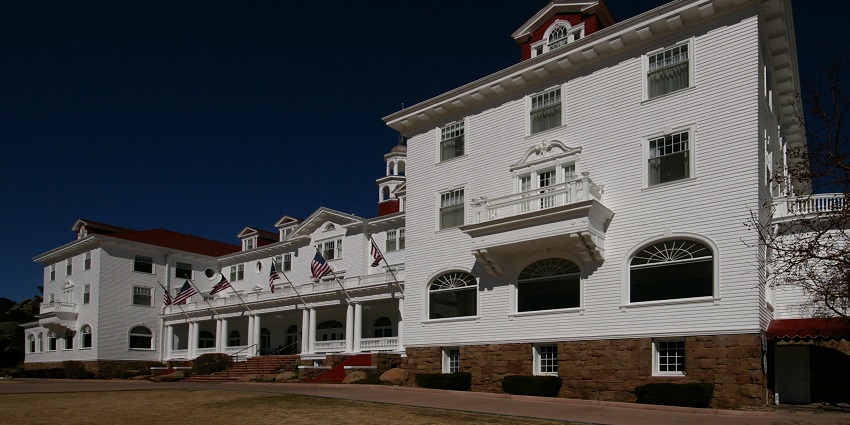 An image of the Stanley Hotel in Colorado, one of the best haunted spots to visit in the US.