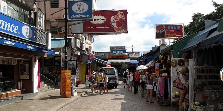 Traditional street market selling clothing, souvenirs, and local goods
