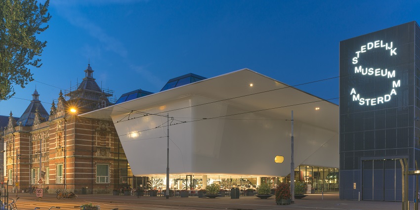 Experience contemporary art at Stedelijk Museum, right next to Moco Museum.