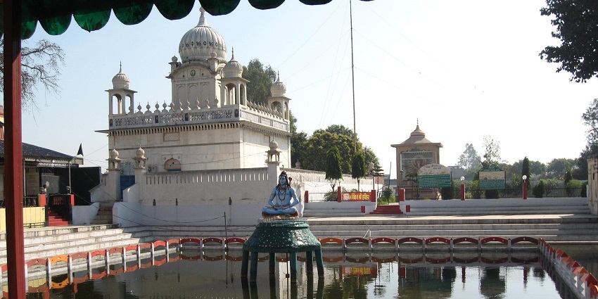 The idol of Lord Shiva is placed in a pond at Sthaneshwar Mahadev Temple in Haryana