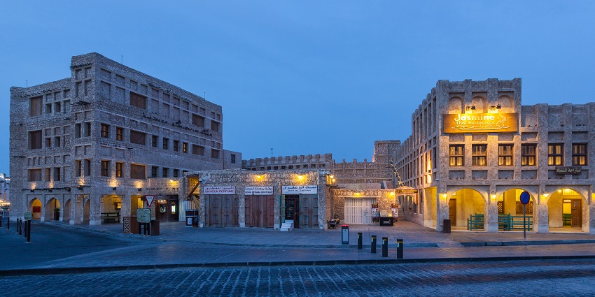 Vibrant market with shops, cafes, and traditional handicrafts.