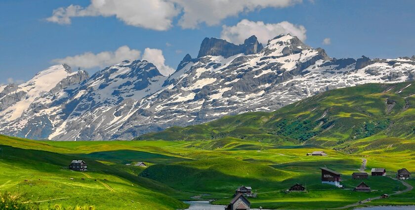 Switzerland travel guide takes you through Lucerne Lake's serene magnificence with snow-capped peaks