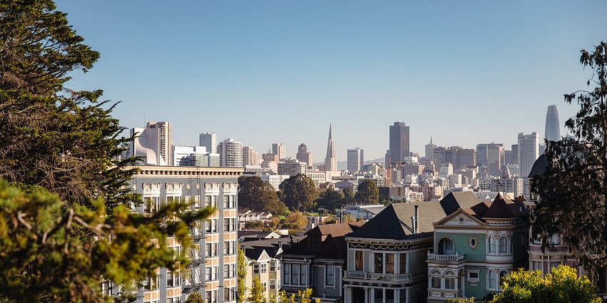 An image of the San Francisco skyline with tall buildings, the Golden Gate Bridge, to celebrate valentines day in the USA.