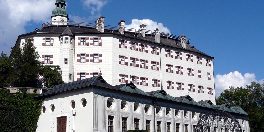 An image of Ambras Castle, its scenic gardens as one of the best things to do in Innsbruck.