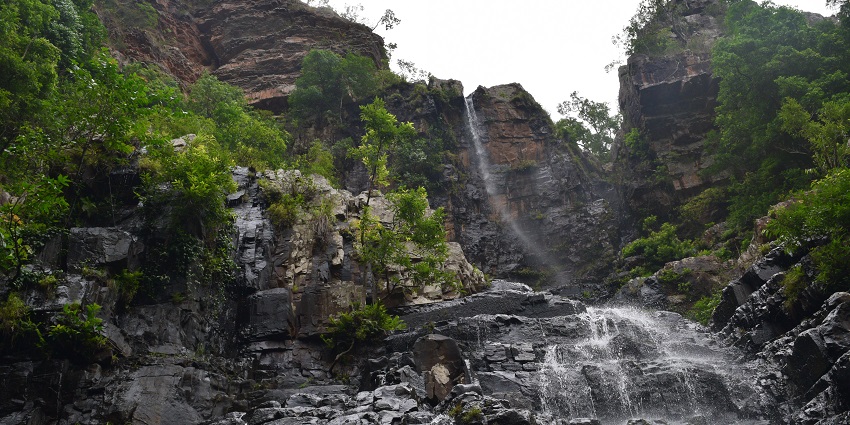 A view of a stunning waterfall in Andhra Pradesh, recommended by Tirupati travel guide.