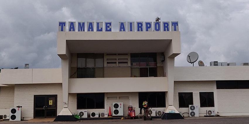 An Africa World Airlines 9G-AET jet parked in the runway of Kumasi Airport.