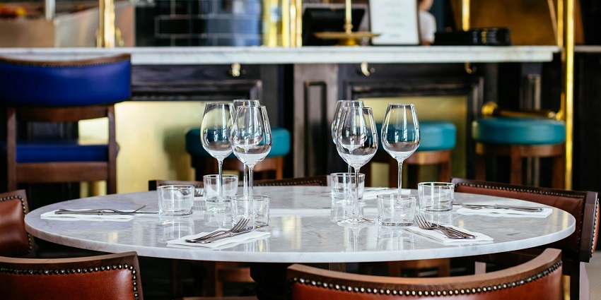 Image of a table with empty glasses on it - perfect for dinner with your family