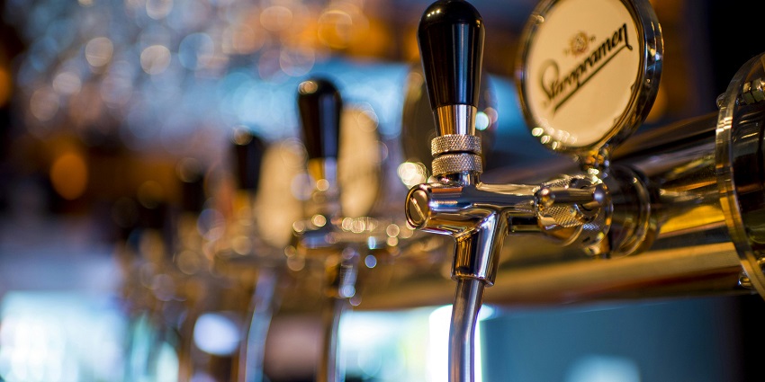 An image showing a beer dispenser, reminiscent of the stylish setup at The Blind Pig.