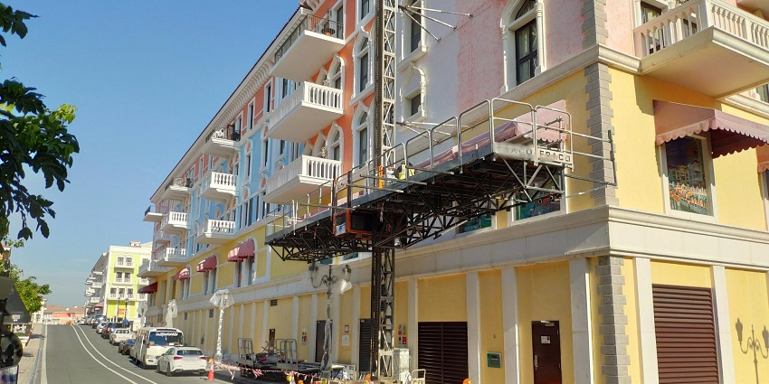 Luxurious man-made island with high-end shopping, dining, and resorts