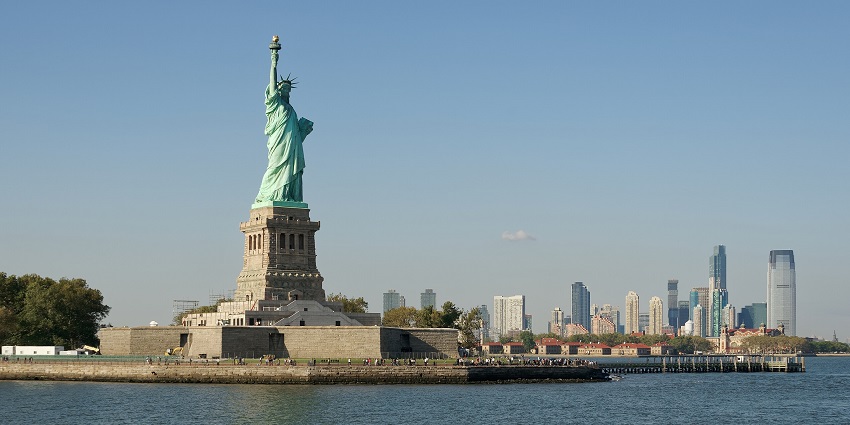 An image of Liberty Island from the ferry with the Statue of Liberty, one of the best spots to celebrate valentines day in New York.