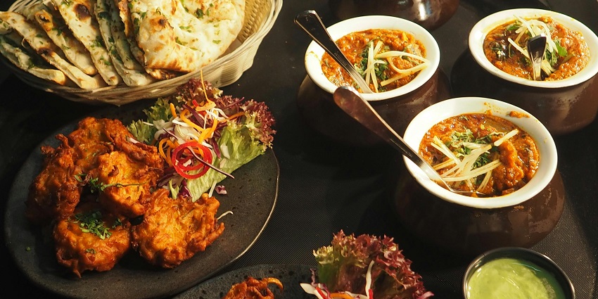 Image of White and Brown Cooked Dish on White Ceramic Bowls