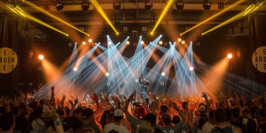 An image of women dancing in a nightclub in Los Angeles with a vibrant atmosphere.