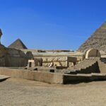 The pyramids of Giza featuring the Sphinx is looking mesmerising under a blue sky