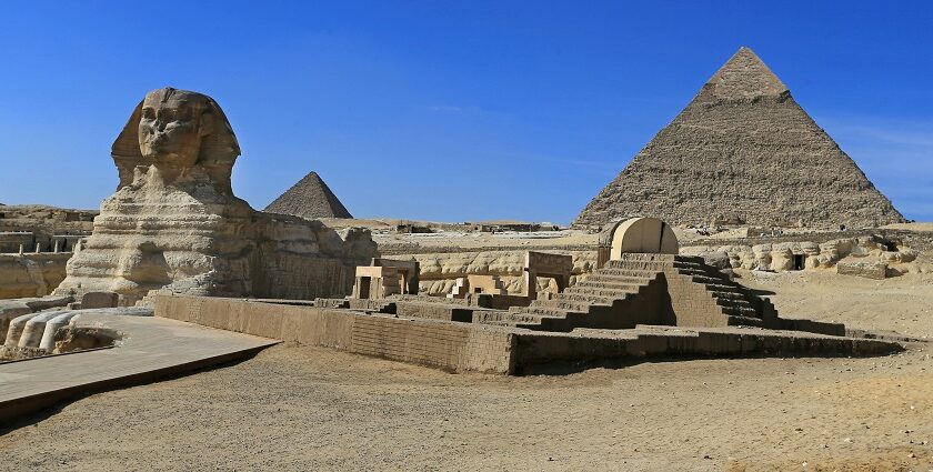 The pyramids of Giza featuring the Sphinx is looking mesmerising under a blue sky