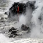 A spectacular moment when hot lava meets the ocean, forming new rocks in Hawaii.