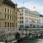 A wide view of the Hotel Les Troi Rois overlooks the Rhine River in Basel, Switzerland.