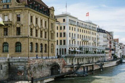 A wide view of the Hotel Les Troi Rois overlooks the Rhine River in Basel, Switzerland.