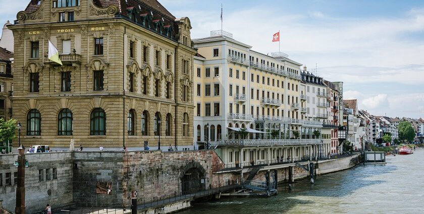 A wide view of the Hotel Les Troi Rois overlooks the Rhine River in Basel, Switzerland.