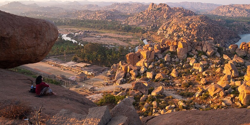 Hampi's ancient granite boulder landscape from Matanga Hill at sunset.