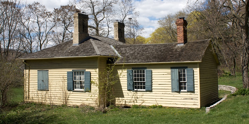 An image of historic Todmorden Mills Heritage Site, featuring restored buildings and gardens.