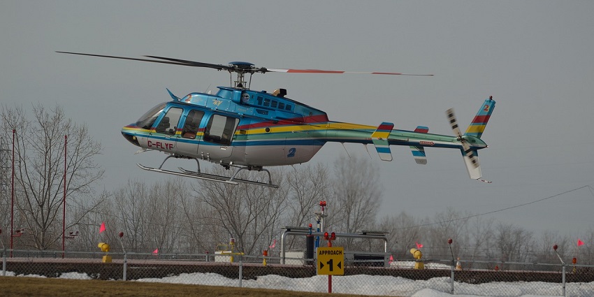 An image of a helicopter taking off from Toronto (Hospital For Sick Children) Heliport.