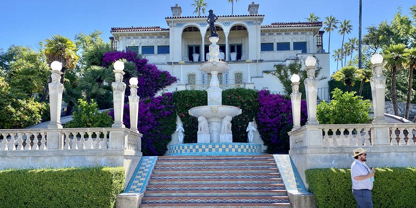 An image of Stairs at Hearst Castle in San Simeon, California, surrounded by ornate architecture
