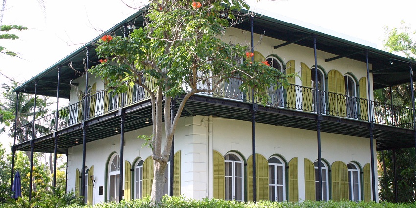 A corner view of the house of Ernest Hemingway, a famous writer, one of the best things to do in Key West Florida in October.