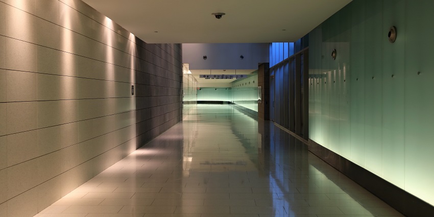 The underground city of RÉSO with green and yellow lighting on the walls