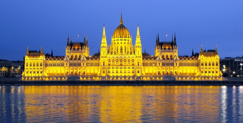 A couple enjoying the stunning views of Budapest with landmarks like the Danube River and Buda Castle.